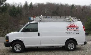 fleet of Sunrise Window Cleaning trucks